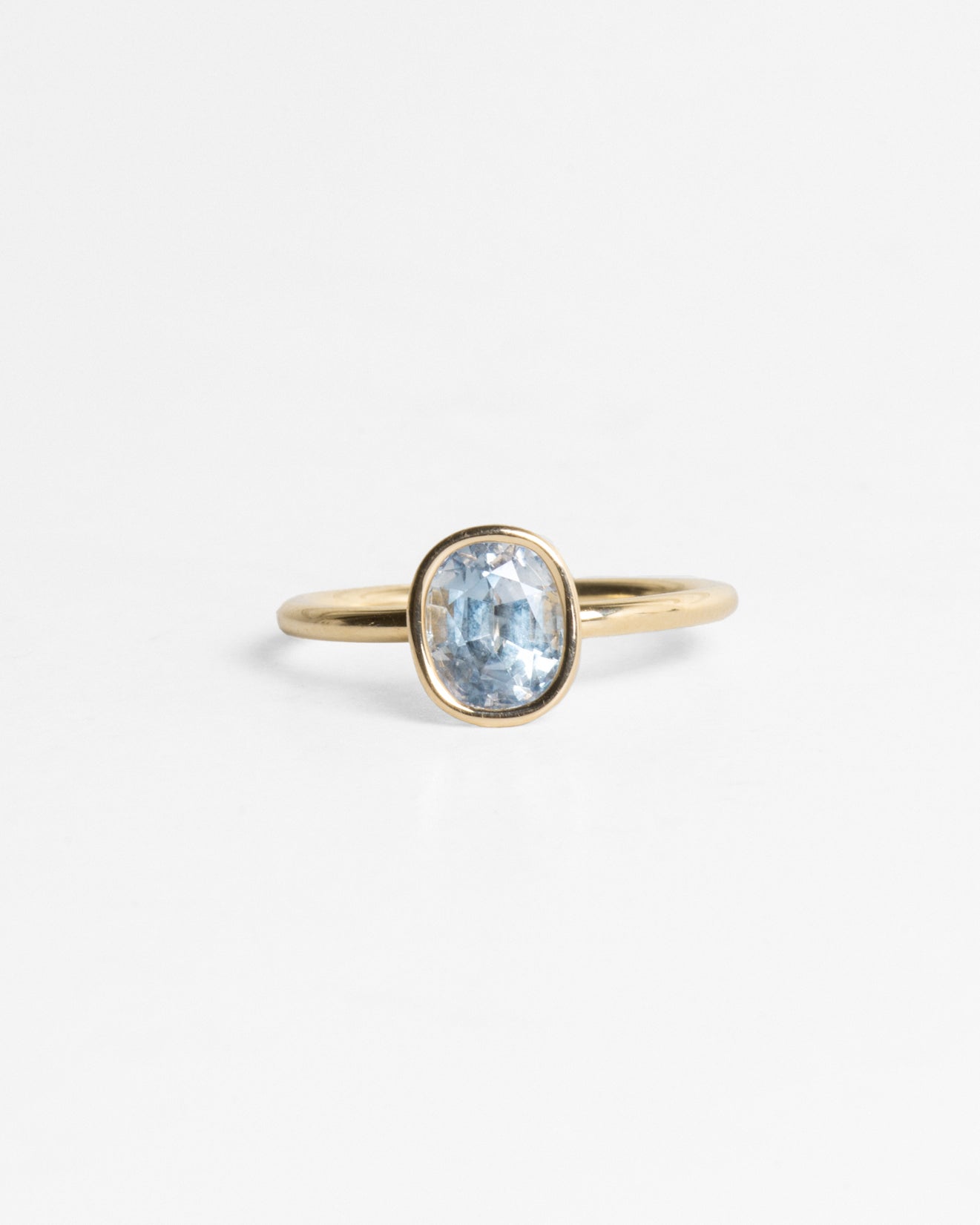 Pale Oval Sapphire Floating Ring in 14K Gold