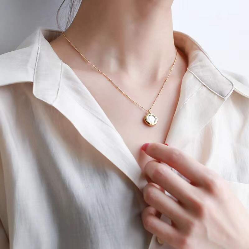 Gold Necklace with Pearl Design