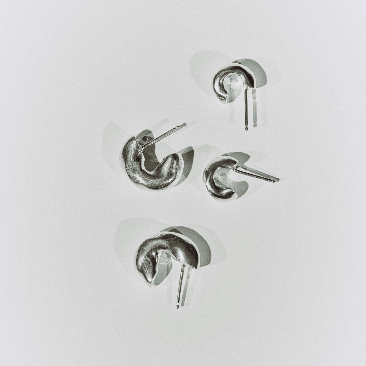 Dahlia Mini Silver Huggie Earrings