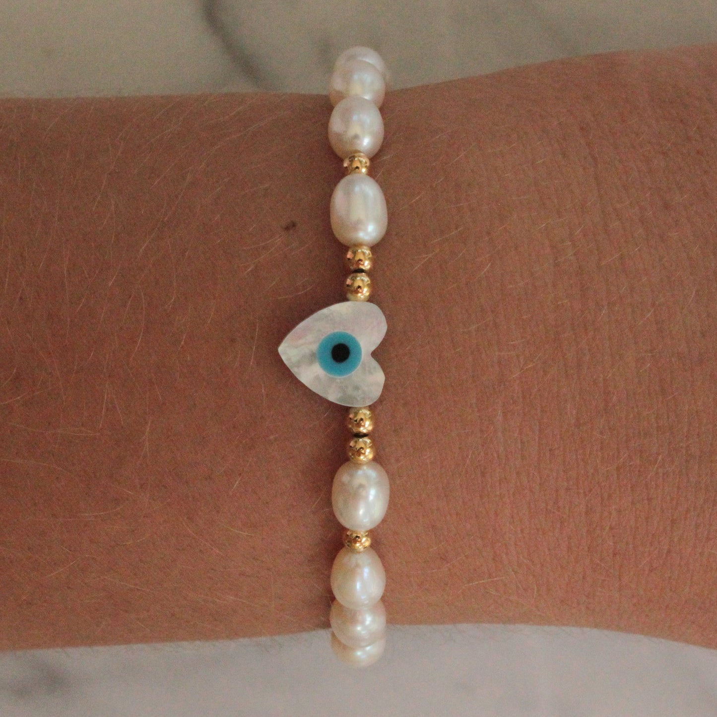 Pearl Evil Eye and Hamsa Bracelet