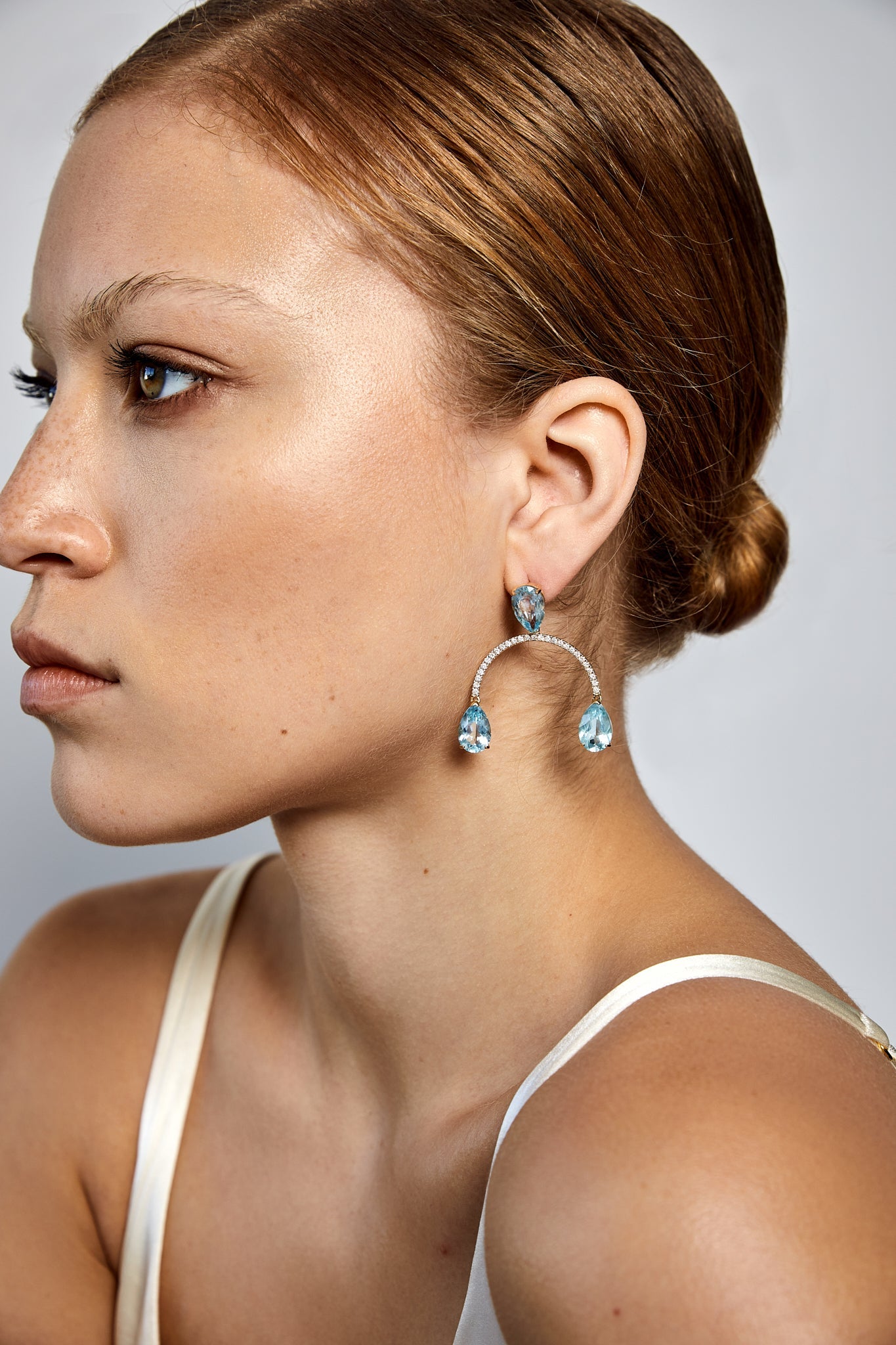 Blue Topaz Teardrop Earrings in 14kt