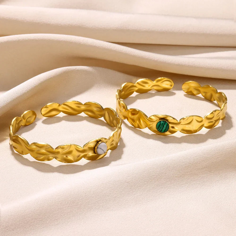 Green Stone and Gold Open Bracelet Design