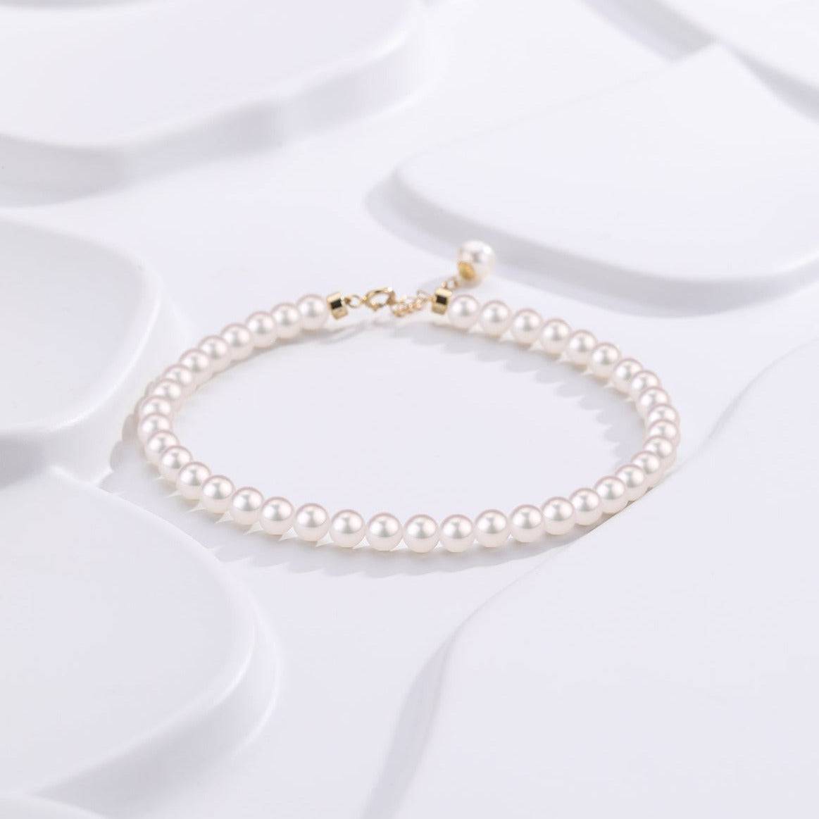 Delicate White Freshwater Pearl Gold Bracelet