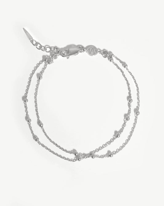 Sleek Double Chain Silver Bracelet Design