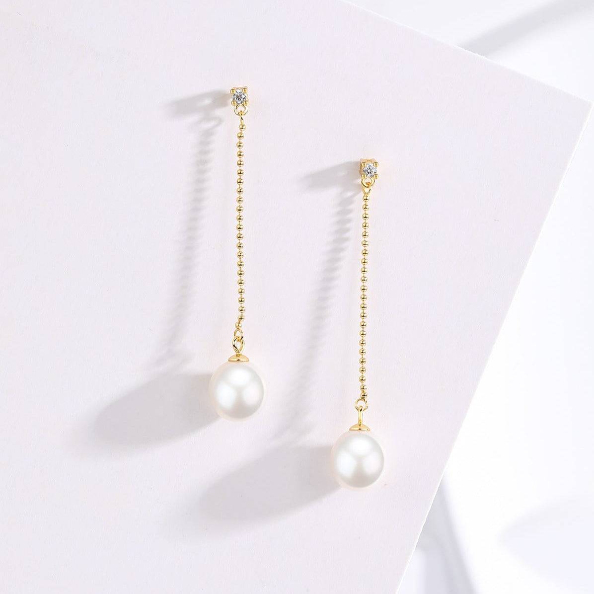 Long Natural Freshwater Pearl Earrings in Elegant Design