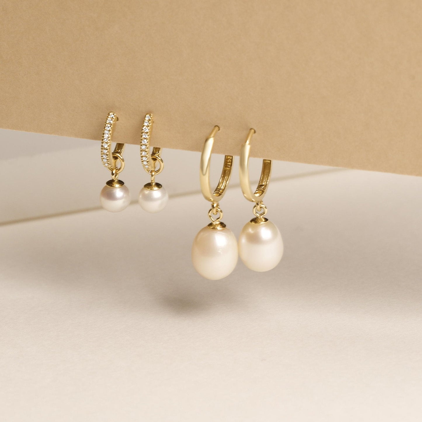 Elegant Elliptical Pearl Huggie Earrings