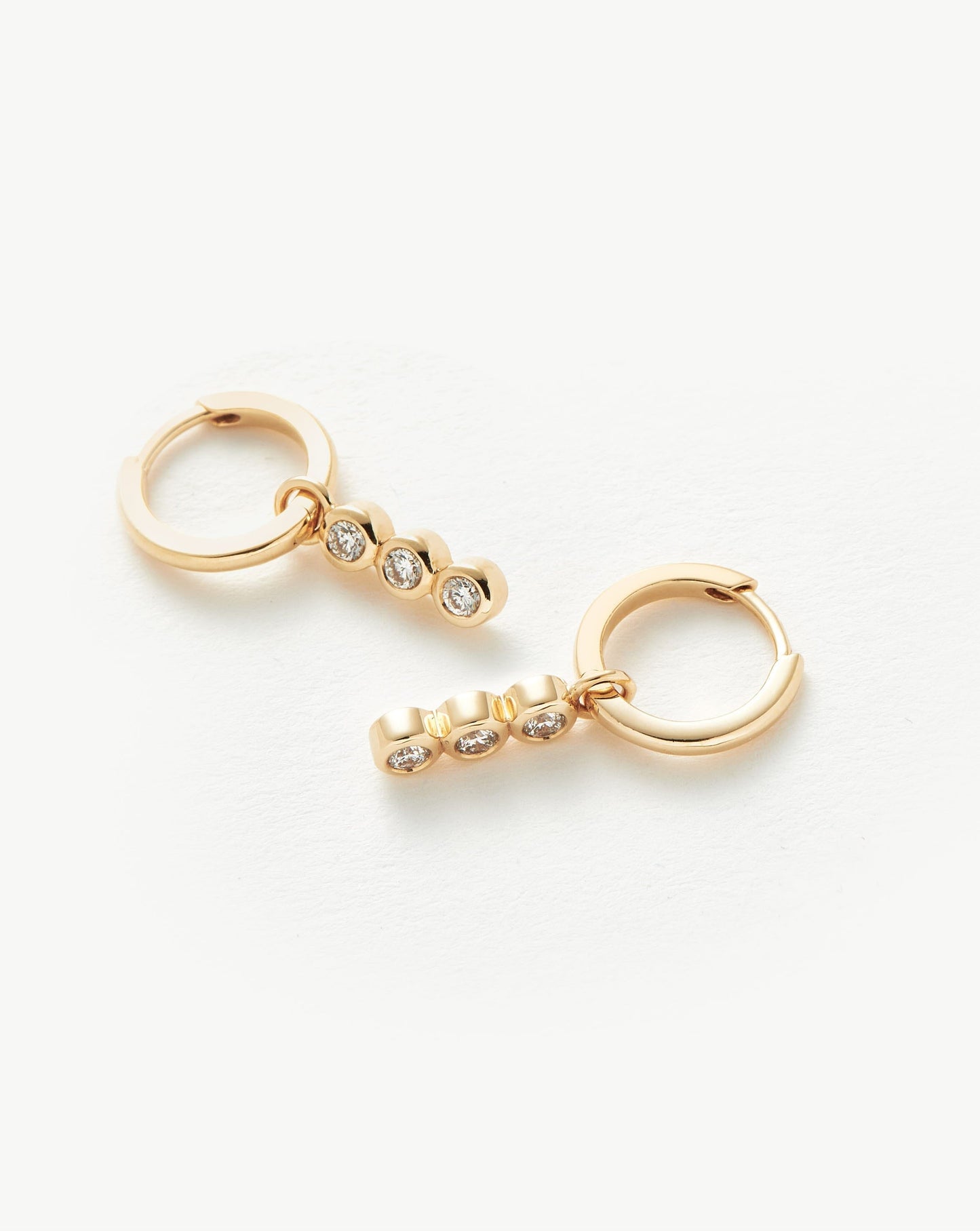 Diamond Charm Hoop Earrings in Fine Style