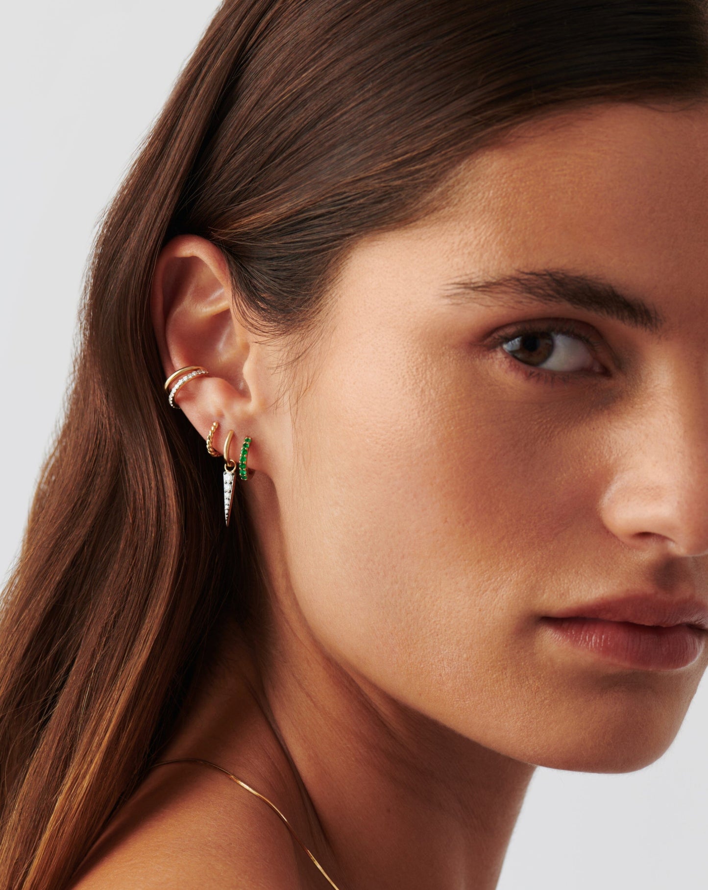 Emerald Huggie Earrings in Fine Design