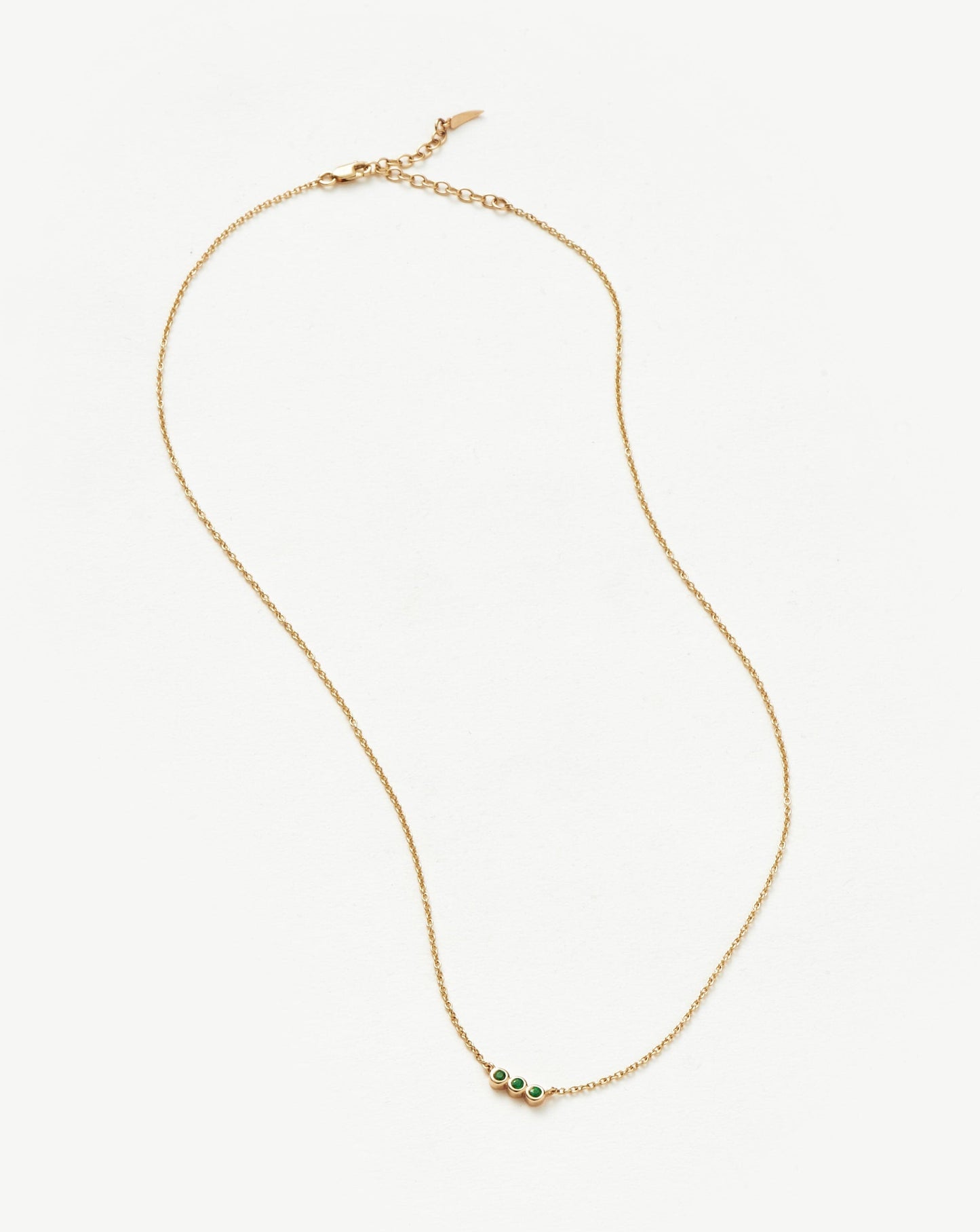 Emerald Solitaire Trio Necklace in Fine Design