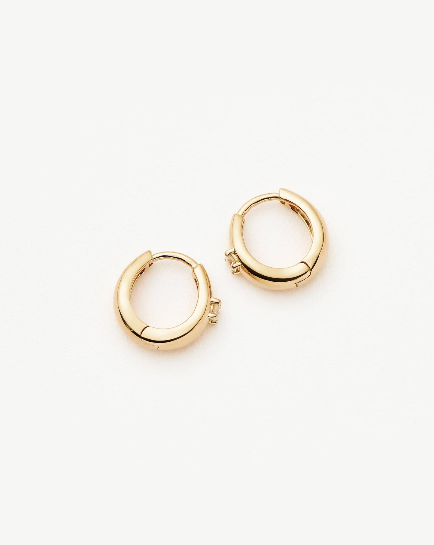 Diamond Dome Huggie Earrings in Solid Gold