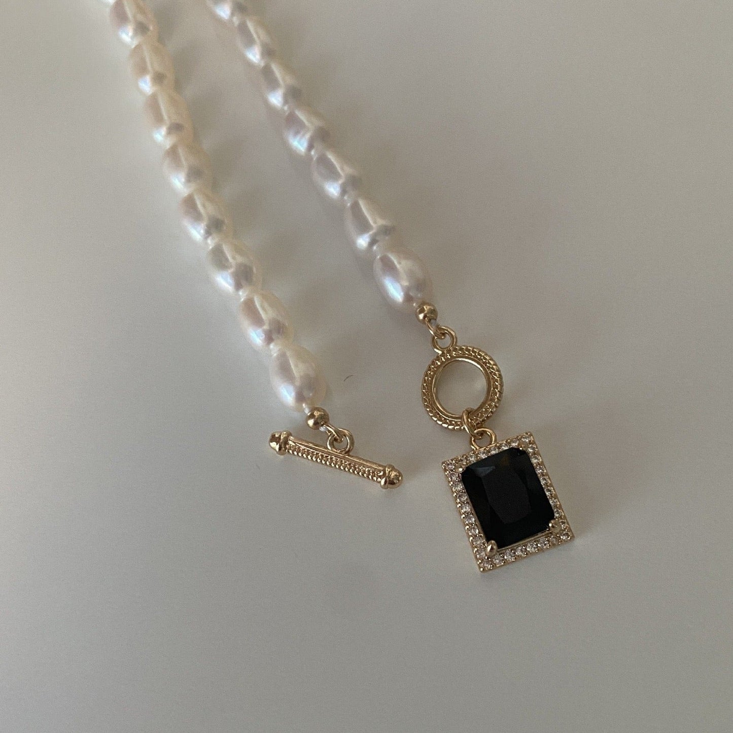 Square Pendant Necklace with Black Pearl Design